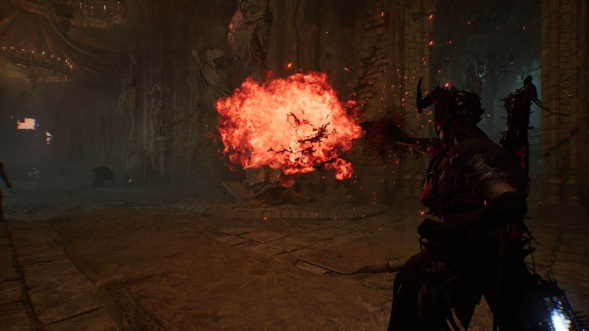 In the game Lords of the Fallen, a character conjures an impressive flame in a dark room using one of the best inferno spells available.