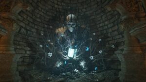 An image of a skeleton sitting in the "cave".
