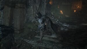 A Dark Souls character is exploring a cave.