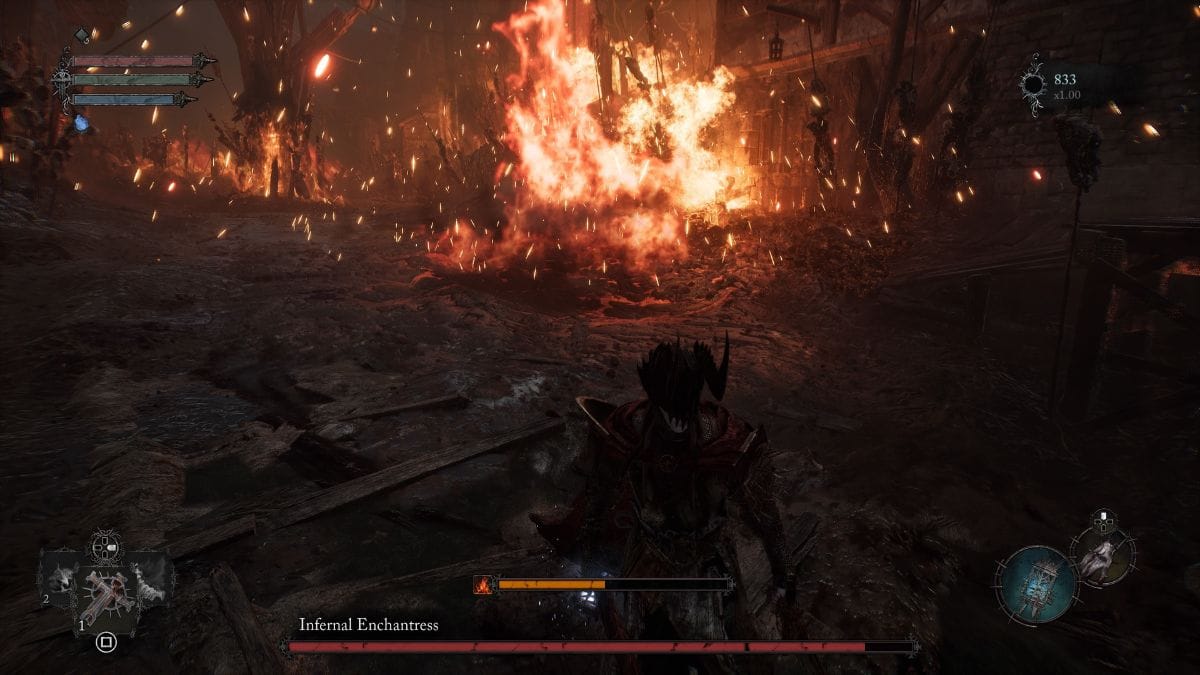 A screenshot of a video game with a fire in the background showing how to beat the Infernal Enchantress.