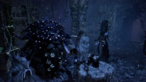 A group of people standing in a dark cave, learning how to farm Umbral Scouring.