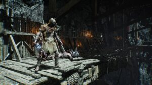 A dark souls character standing on a bridge in Lords of the Fallen.