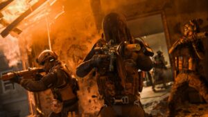 MW3 game modes: Players stand in orange light as they advance with guns out