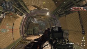 A player entering a pipe structure in Modern Warfare 3.