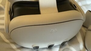 A pair of stellar vr headsets sitting on a bed, offering review-worthy VR gaming and mixed reality for all.