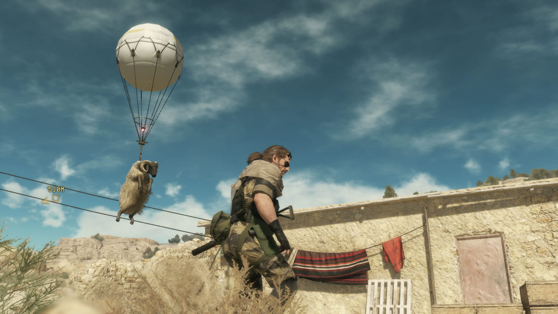 Snake performs a Fulton extraction on a goat in Metal Gear Solid 5’s desert mission area