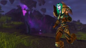 wow classic cataclysm release date - a night elf runs through a dark setting