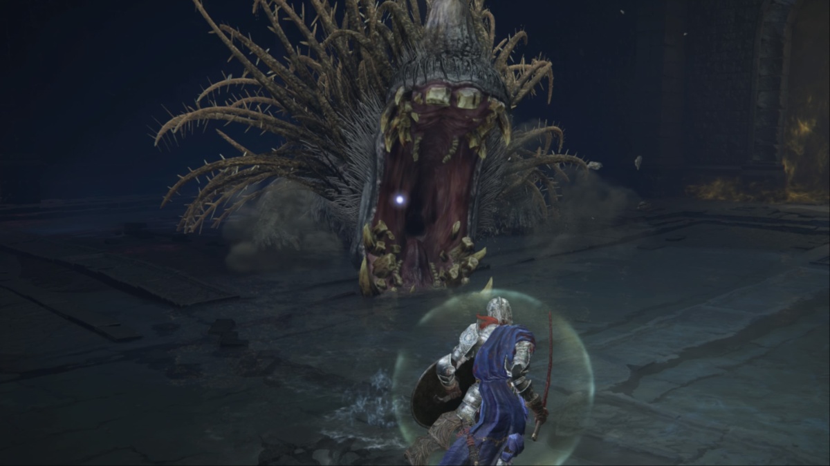 golden hippo bost fight elden ring shadow of the erdtree - a hippo lunges with its mouth open
