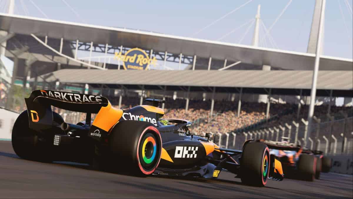 f1 24 release time - Two Formula 1 cars race on a track