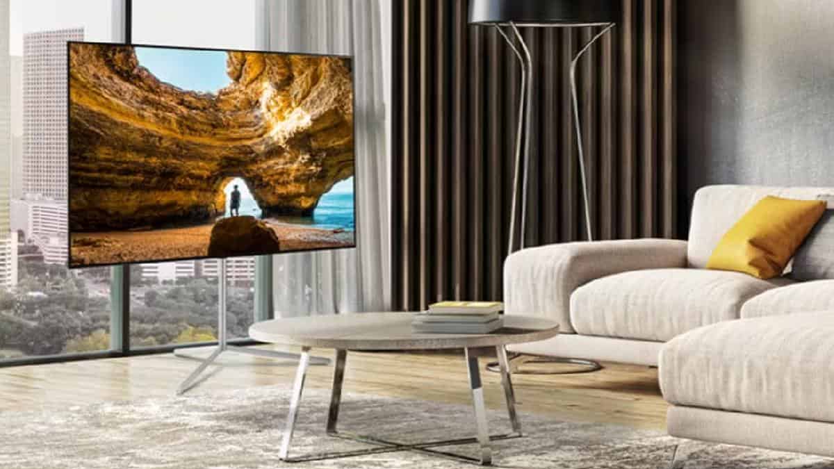 A living room with a flat screen OLED gaming TV.