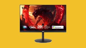 A computer monitor with a red dragon on it.