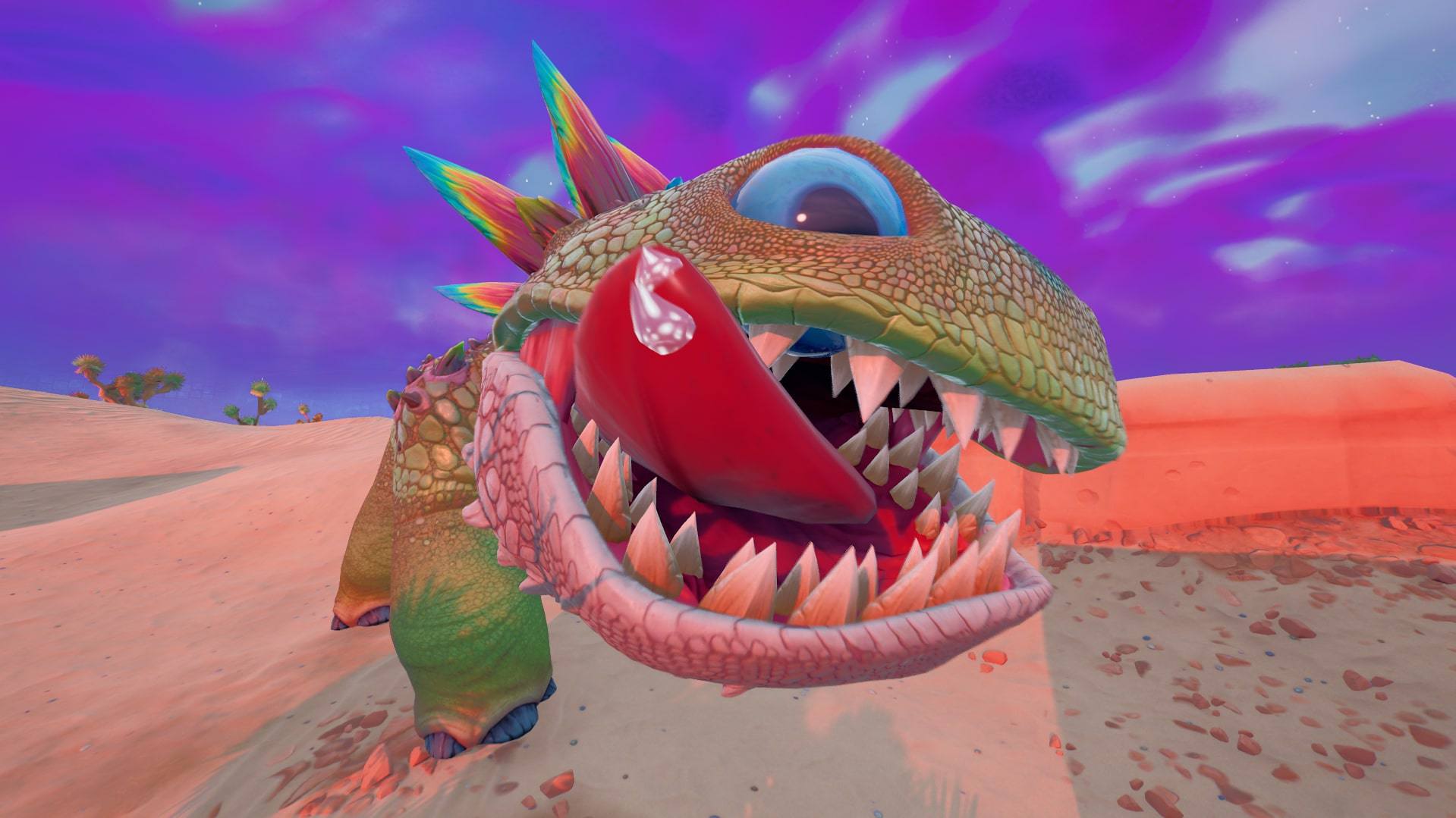 A cartoon of a monster with sharp teeth.