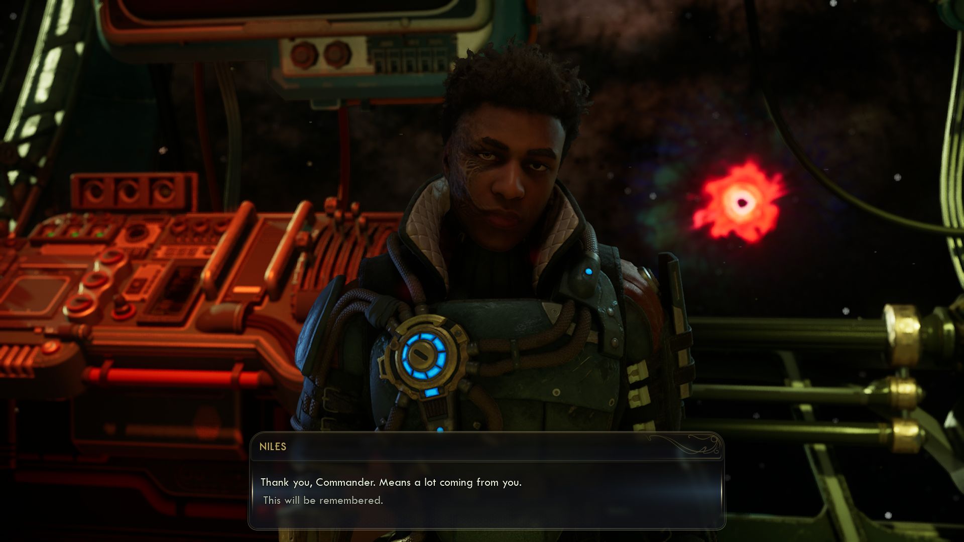 Niles speaks to the Commander aboard a spaceship in The Outer Worlds 2, with a glowing red celestial object visible through the window behind him.