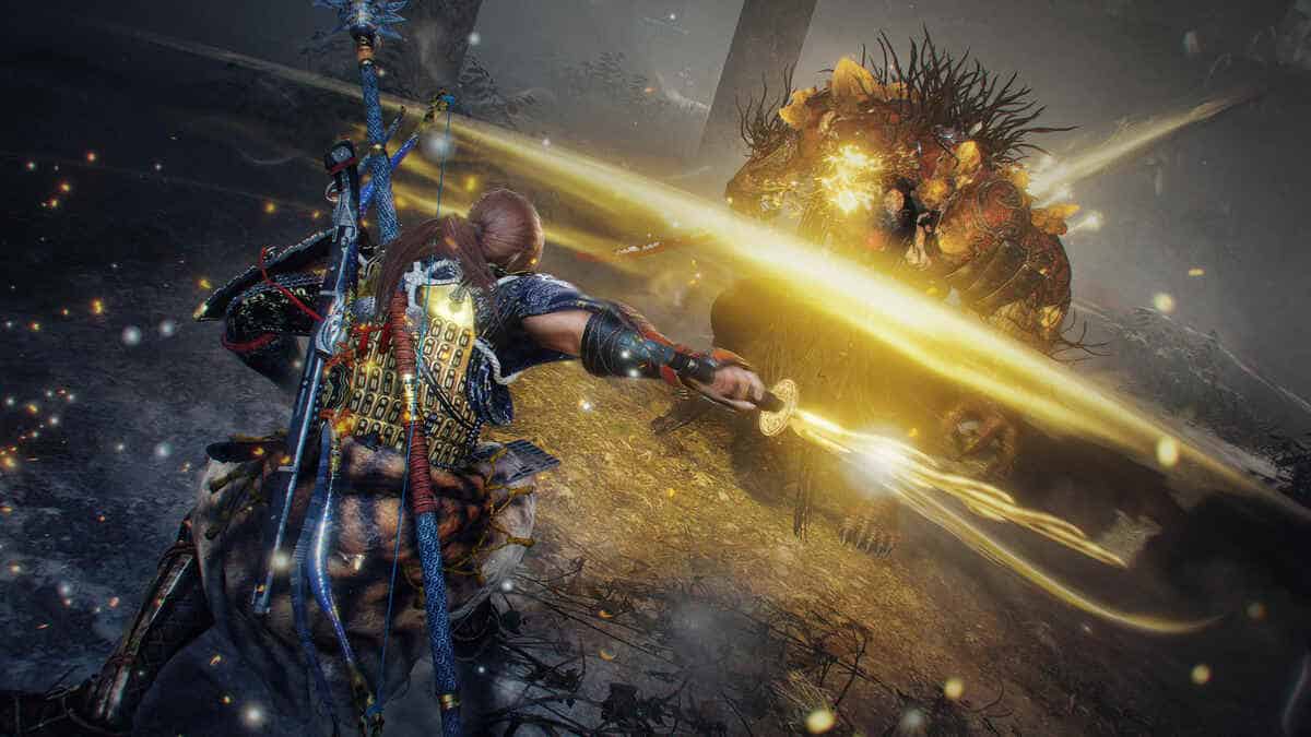 A character in detailed armor wields a glowing sword against a large, monstrous creature in Nioh 2