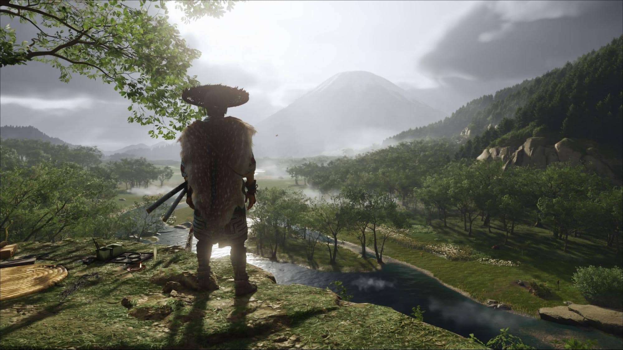 Warrior in Ghost of Yotei stands on a cliff, watching the misty valley and Mount Yotei in the distance