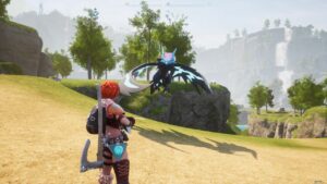 A woman is standing on a hill with a dragon in the background.