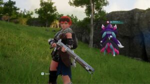 A woman is holding a gun in front of a grassy field, creating an intense and powerful image.