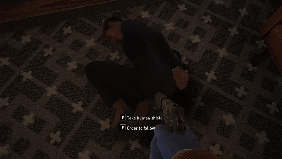 A person in Payday 3 is laying on the floor in a video game.