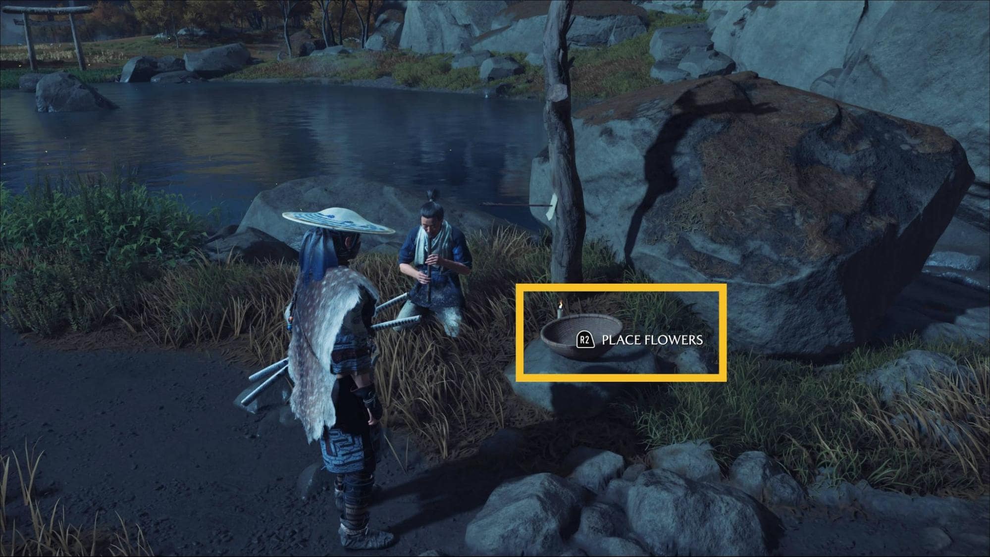 Player placing collected flowers in the basket near the Amber Respite Shrine to complete the A Flower for Your Thoughts quest in Ghost of Yotei