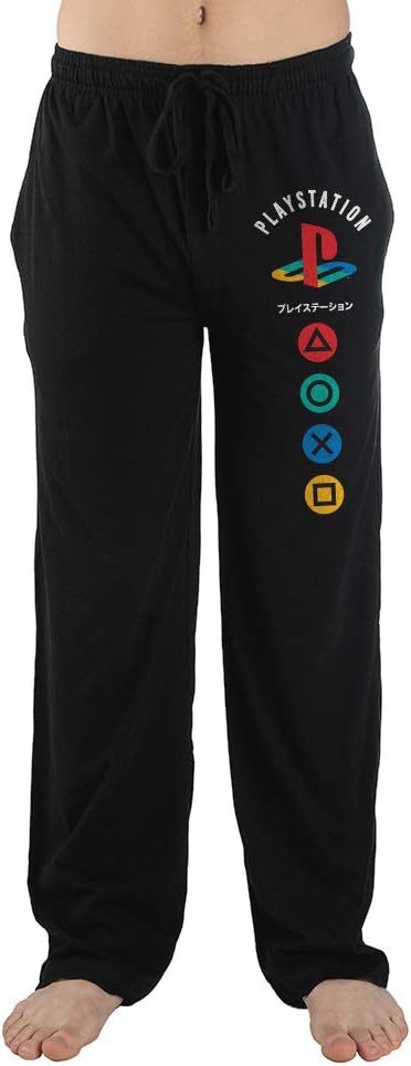 A woman sporting black sweatpants featuring a playstation logo on them.