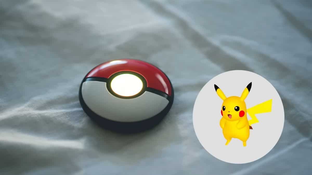 A Pikachu is sitting on top of a bed.