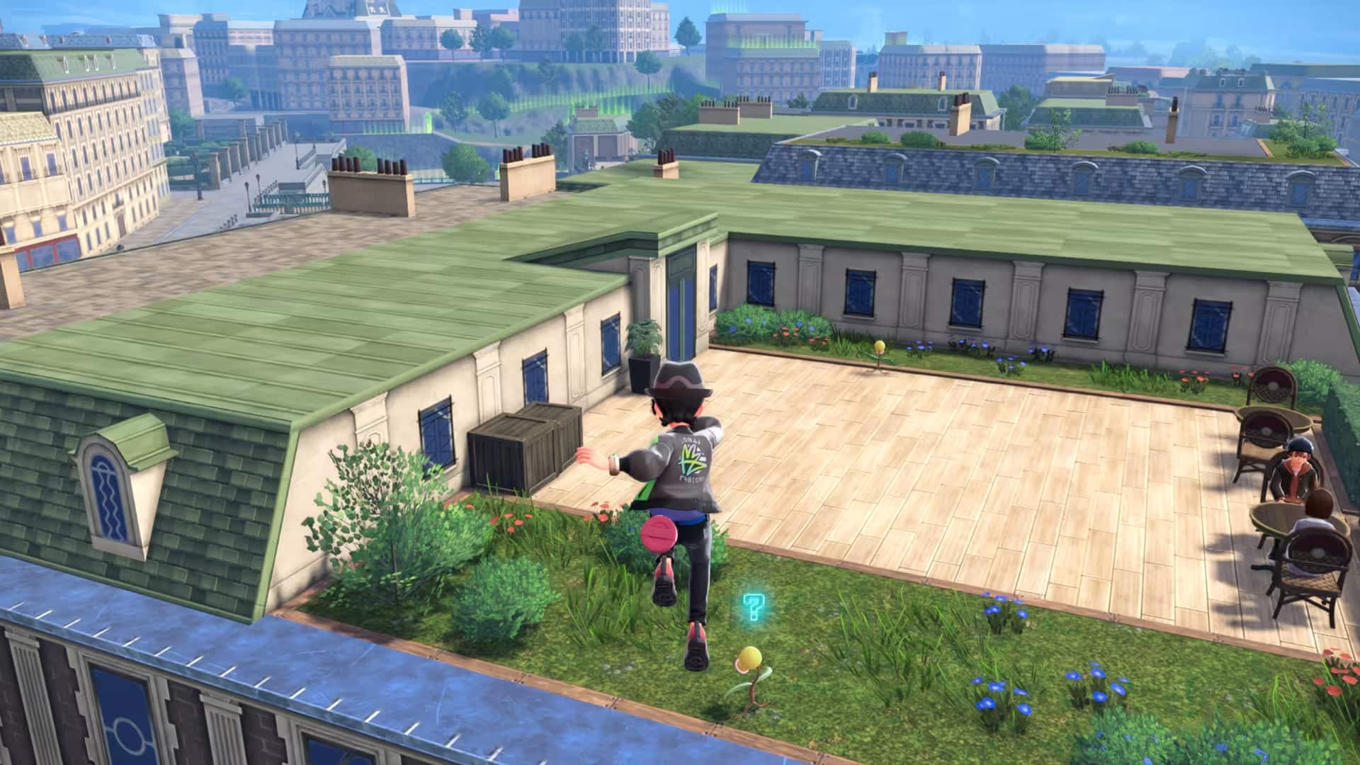 A trainer jumps across a green rooftop garden in Lumiose City in Pokémon Legends Z-A, with scenic Parisian-style buildings stretching into the distance