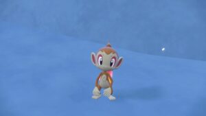 Pokemon-Scarlet-Violet-Indigo-Disk-Catch-Chimchar-Pokemon-Standing-In-Snowfield