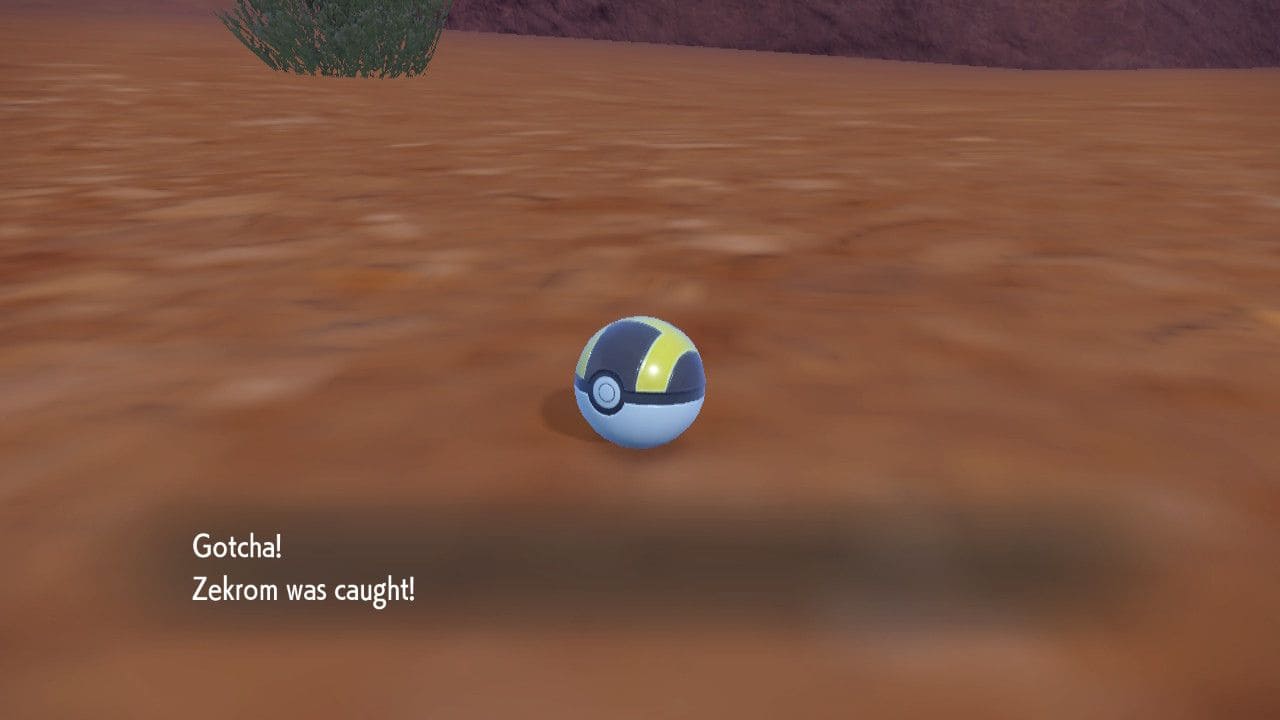 Pokemon-Scarlet-Violet-Indigo-Disk-Catch-Zekrom-Ultra-Ball-Laying-on-Ground