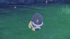 Pokemon-Scarlet-and-Violet-Indigo-Disk-Catch-Shieldon-Pokemon-Standing-In-Grassy-Plain
