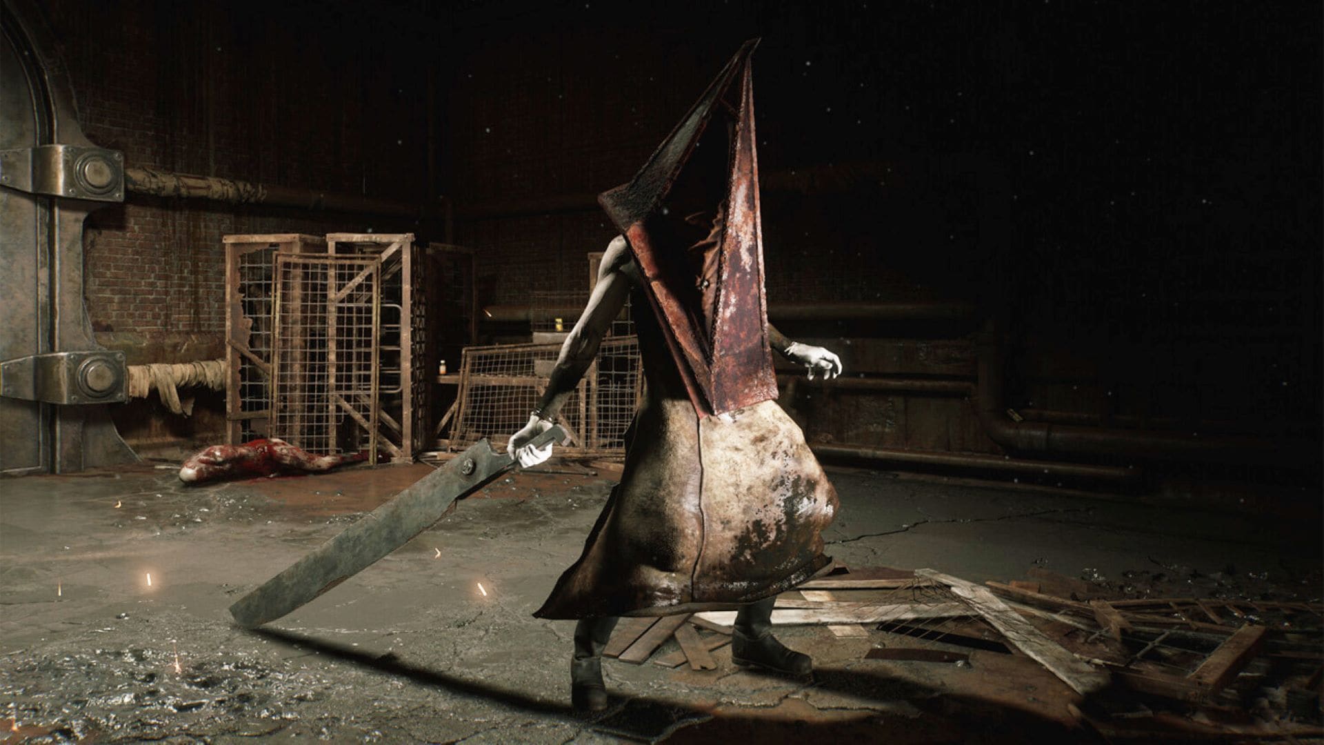 Pyramid Head standing in a dark industrial room in the Silent Hill remake developed by Bloober Team