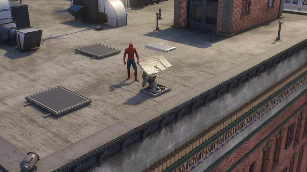 Spider-Man is standing on the roof of a building in Spider-Man 2.