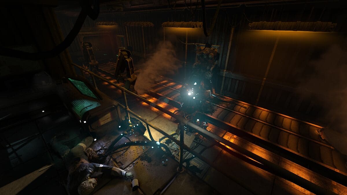 A dimly lit industrial setting with tracks on the floor in SOMA.