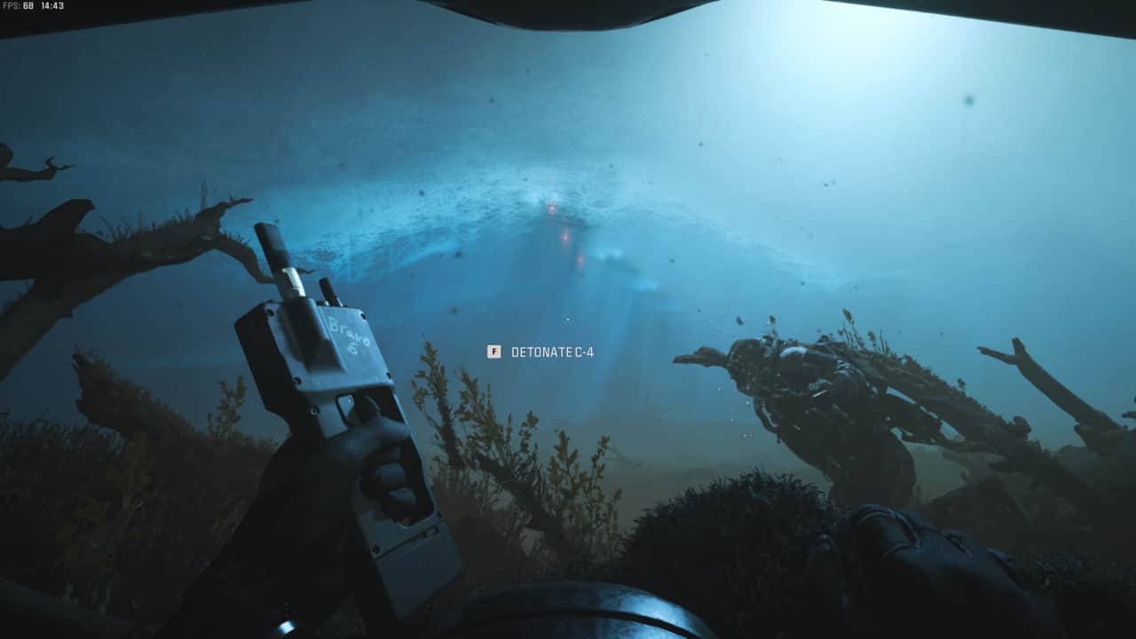 Modern Warfare 3 Frozen Tundra: soldier holding C4 detonator underwater.