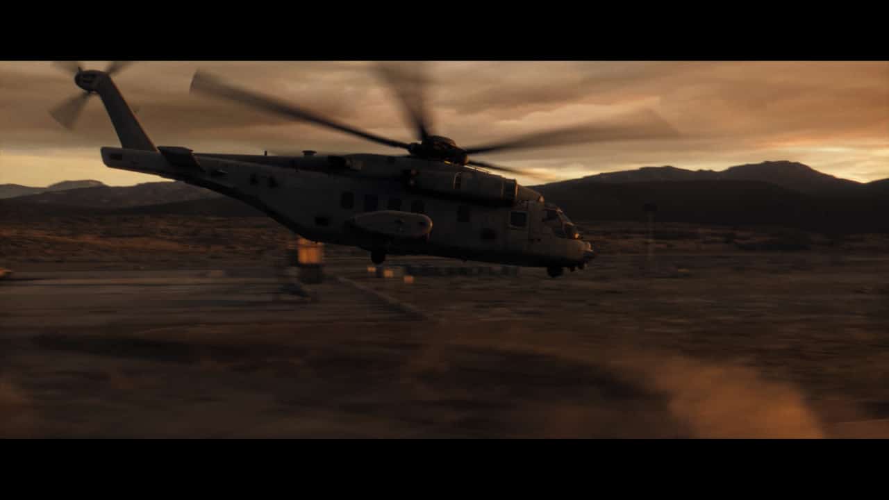 Modern Warfare 3 Danger Close: helicopter above a desert with mountains in the background.