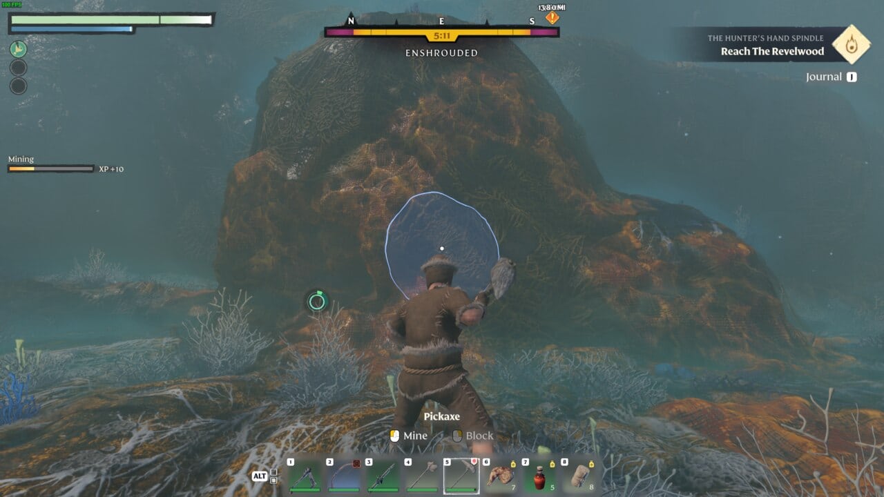 A screenshot of a character standing on an Enshrouded rock in a video game.