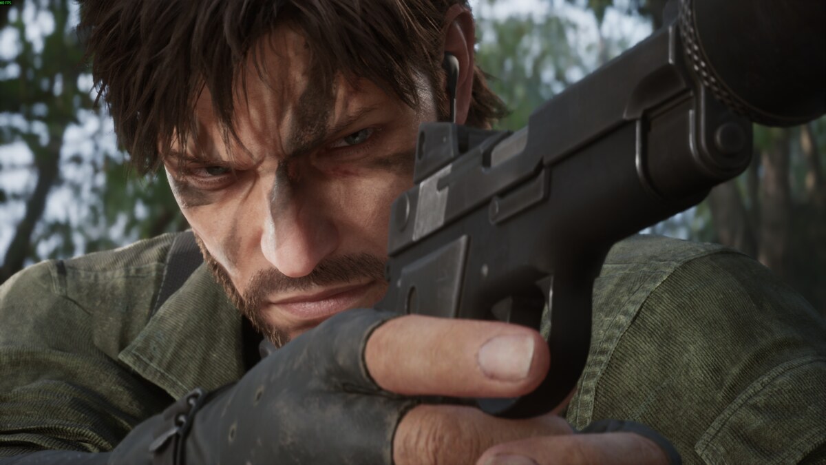 Metal Gear Solid Delta: Snake Eater review: Naked Snake aiming a pistol.