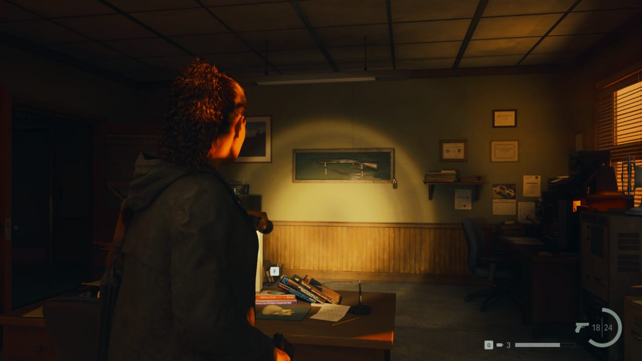 Alan Wake 2 Sheriff's Station shotgun code solution: shotgun in glass weapon case in the Sheriff's Station.