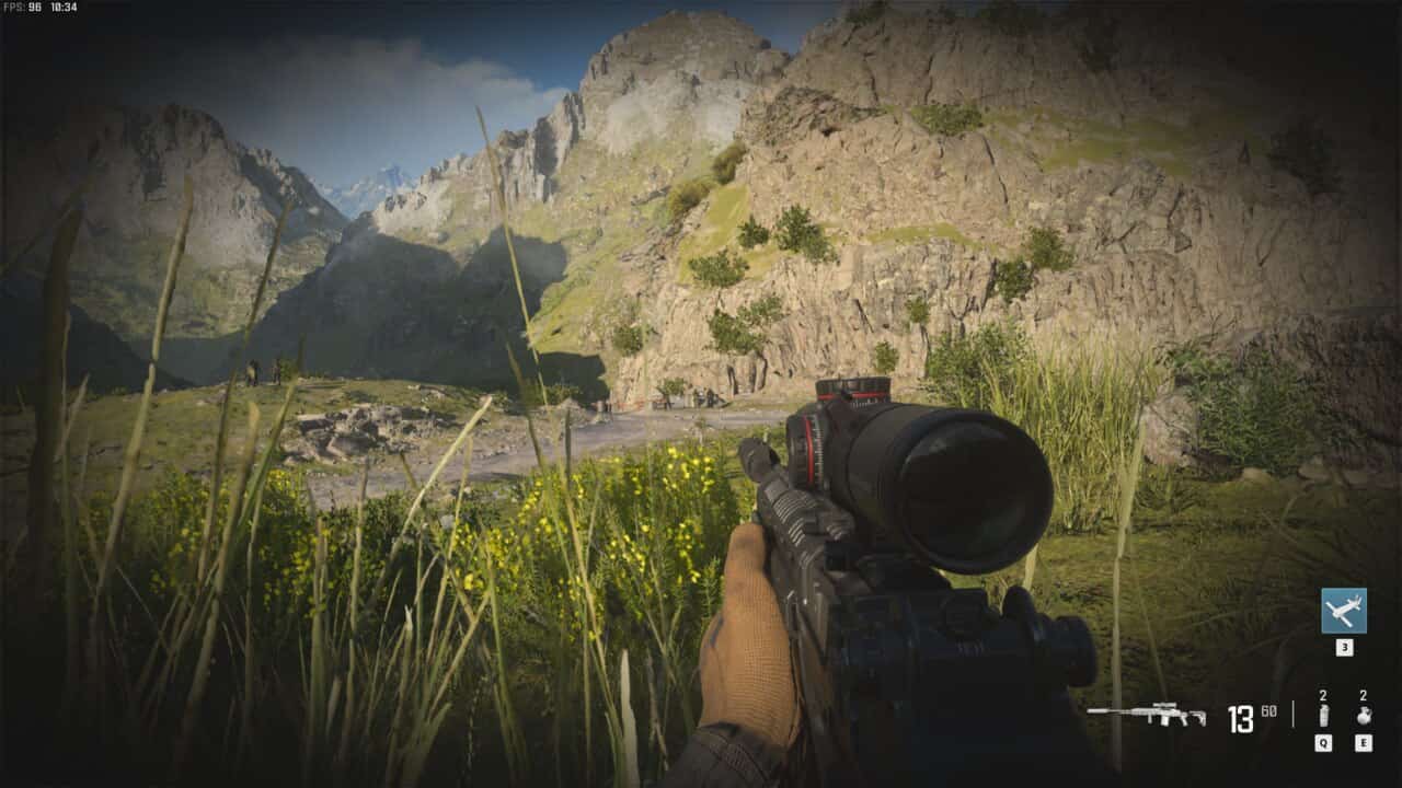 Modern Warfare 3 Payload: soldier crouched in grass.