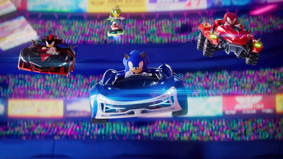 Sonic, Shadow, Jet, and Knuckles speed through the arena in Sonic Racing CrossWorlds