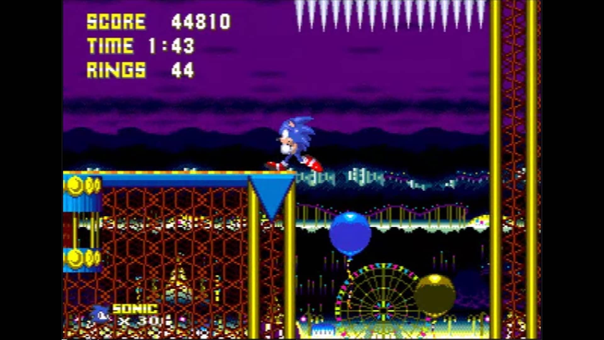Sonic runs through a neon carnival stage at night in Sonic Hacking Contest 2025, with a ferris wheel glowing in the background under a purple sky.