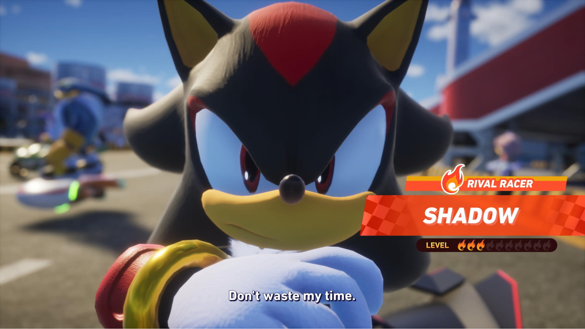 Shadow the Hedgehog, a character of Sonic Racing CrossWorlds with red and black spiky fur, glares intensely. Text reads "Don't waste my time" 