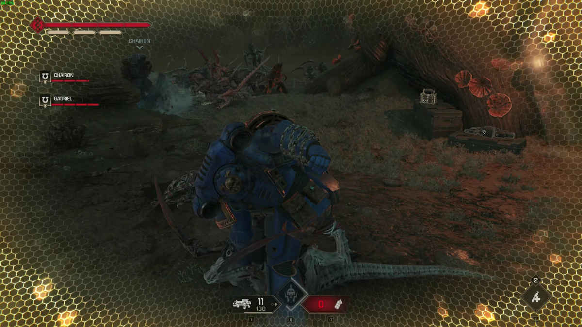 Space Marine 2 repair armor: Titus repairing his armor to full, indicated by the golden glow after executing an enemy.