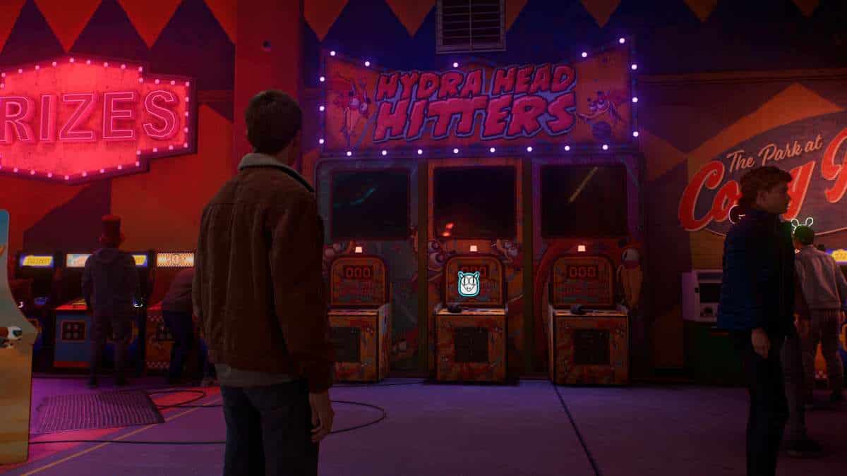 Here are the best Spider-Man 2 easter eggs we've found so far - a group of people standing in front of arcade machines.