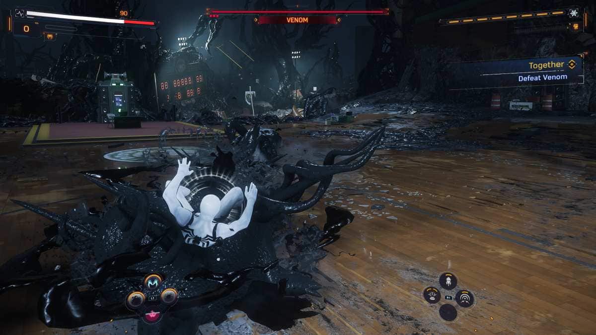 A screenshot of Spider-Man 2 featuring the menacing villain Venom on the floor.