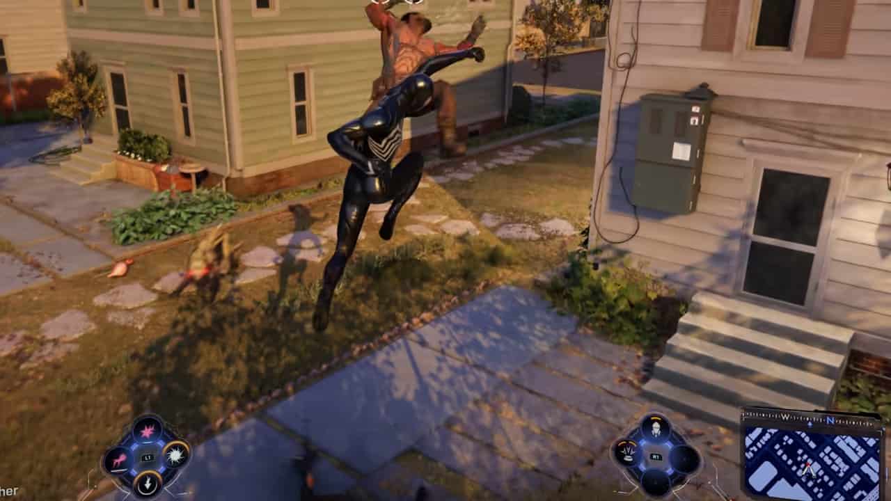 Spider-Man 2 release date: Symbiote-infused Peter punches an enemy up into the air. 