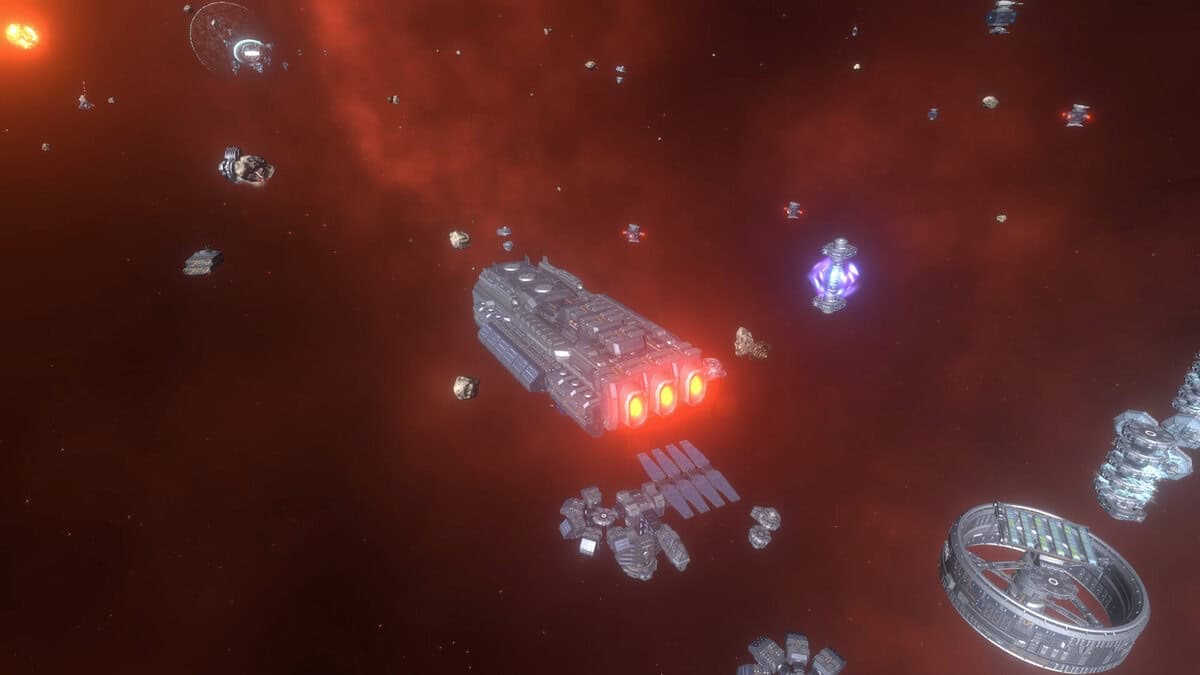 A large spaceship with glowing engines travels through space in Ancient Space