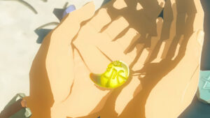 How to keep warm in Tears of the Kingdom: Zelda holding yellow amulet.