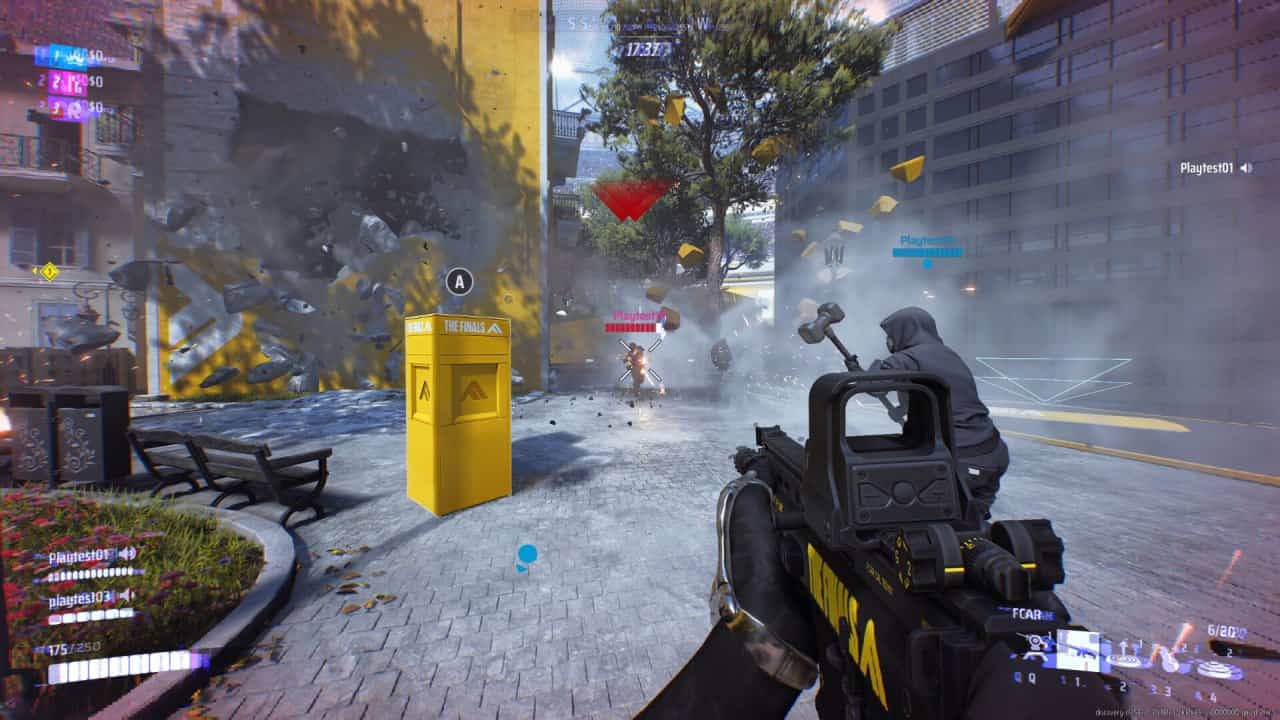 First-person view in "The Finals" video game showing a player aiming an assault rifle at an enemy during an urban combat scenario, with debris flying around.