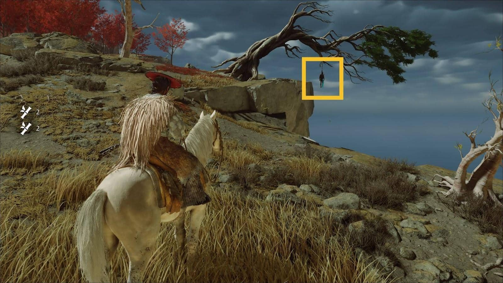 A character in a furry cloak on horseback overlooks a rugged cliffside with a twisted tree in Ghost of Yotei