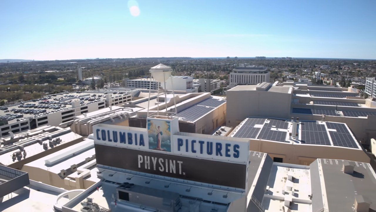 Aerial view of Columbia Pictures studio with a prominent sign and water tower